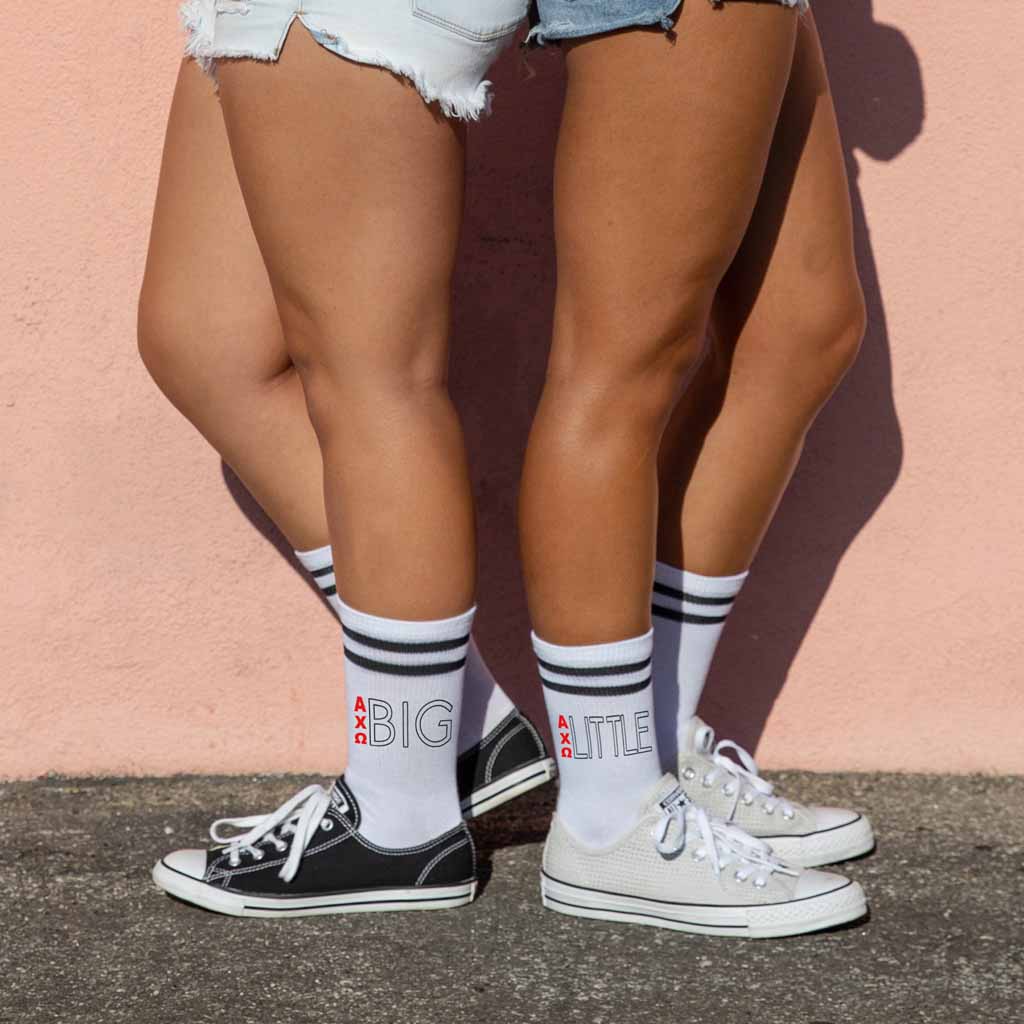 Big or little digitally printed with AXO greek letters on black striped white cotton crew socks.