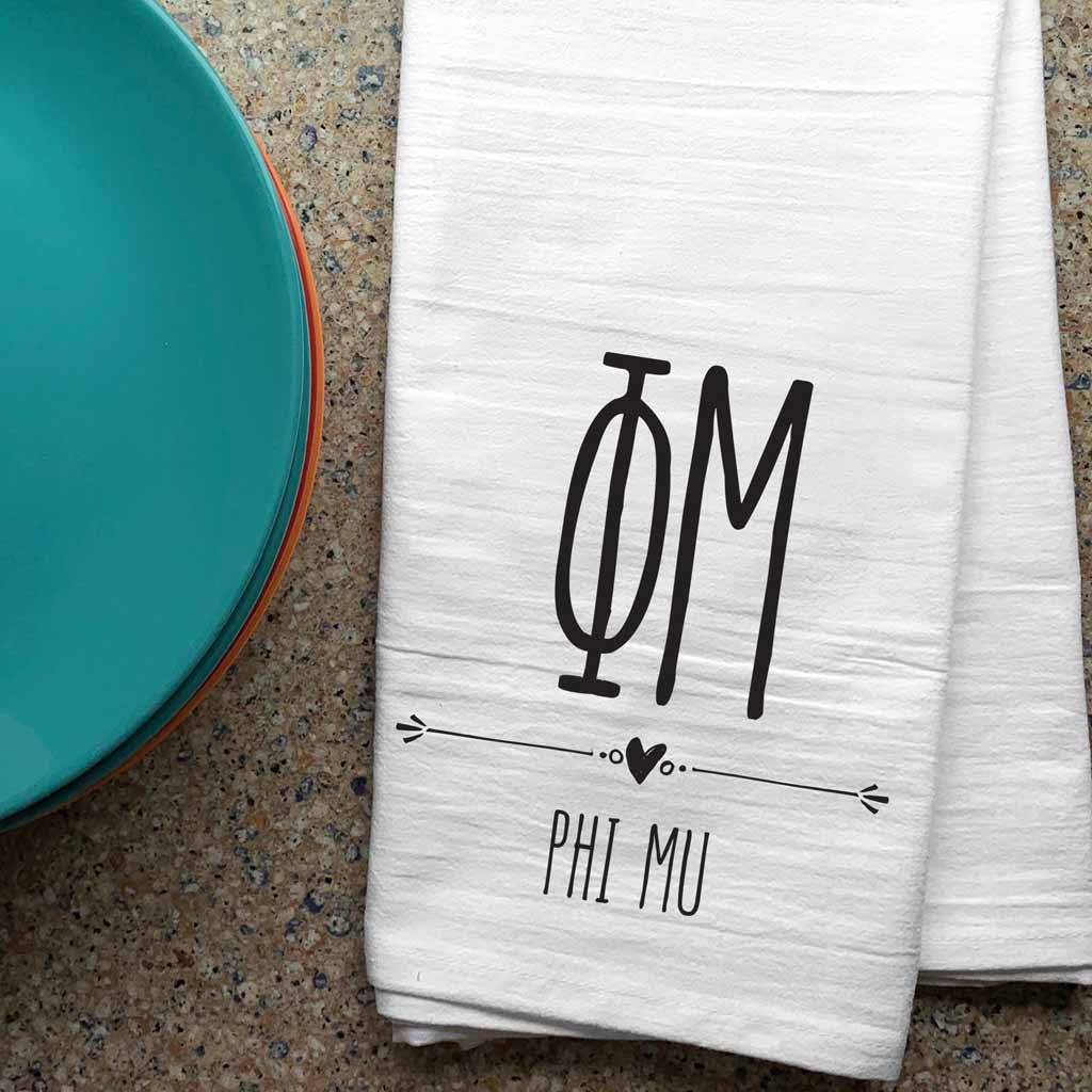 Phi Mu sorority letters and name digitally printed in black ink boho style design on white cotton dishtowel.