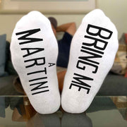 Bring me a martini custom printed on the soles of white cotton no show socks.