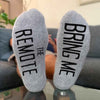 "Bring me the remote", custom printed on the bottom soles of the cotton footie no show socks, makes a great gift for your special someone.