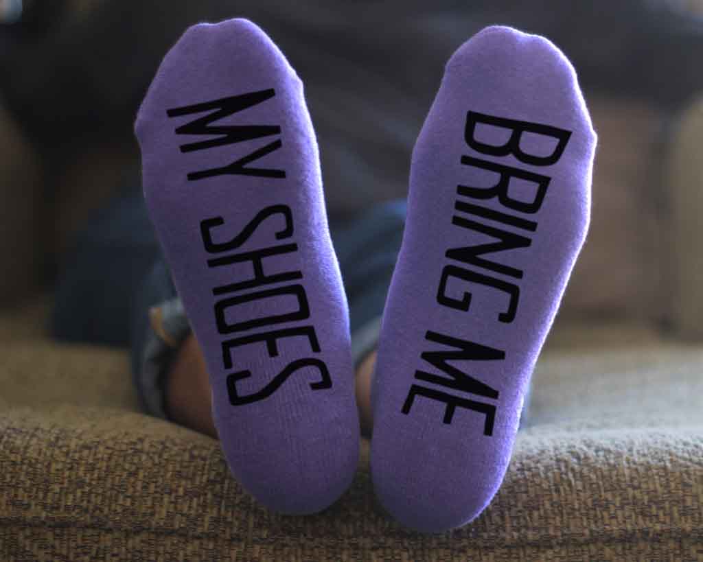 Bring me my shoes custom printed on the bottom soles of the socks.