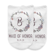 Floral wedding party monogram design custom printed on no show socks make a fun gift.