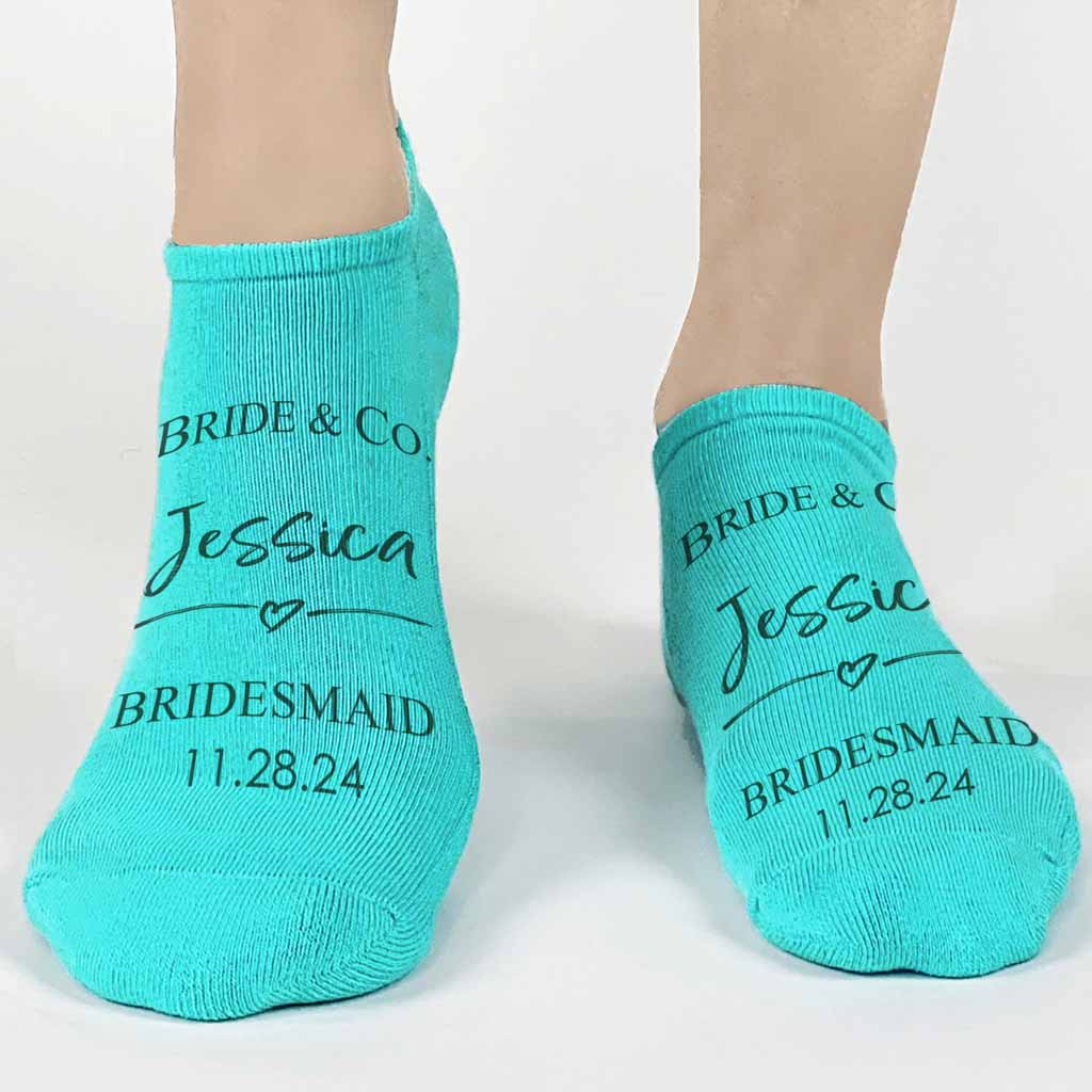 Something blue made special for the bridal party are these super cute custom printed bride and co tiffany style design digitally printed on no show turquoise socks.