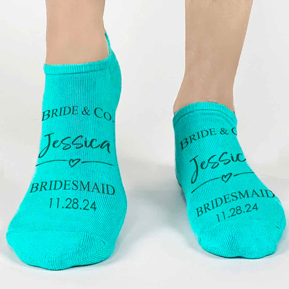 Something blue made special for the bridal party are these super cute custom printed bride and co tiffany style design digitally printed on no show turquoise socks.