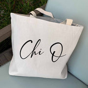 Chi Omega sorority nickname digitally printed in script writing on canvas tote bag is the perfect accessory for your sorority sister.