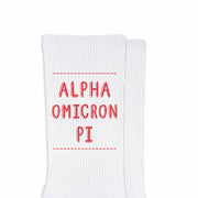Alpha Omicron Pi sorority name design printed in sorority colors on comfy white cotton crew socks is the perfect gift for your sorority sisters.