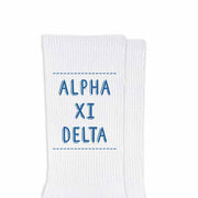 Alpha Xi Delta sorority name design printed in sorority colors on comfy white cotton crew socks is the perfect gift for your sorority sisters.