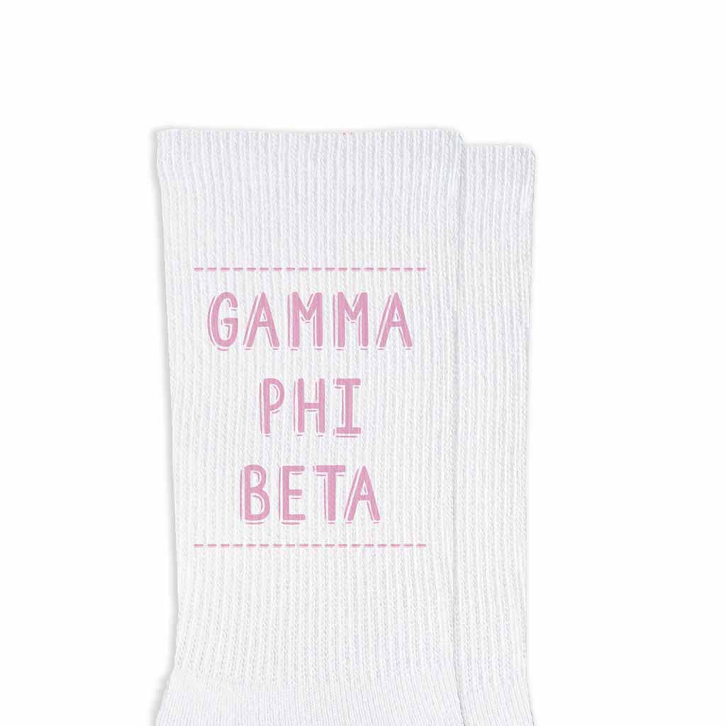 Gamma Phi Beta sorority name design printed in sorority colors on comfy white cotton crew socks is the perfect gift for your sorority sisters.