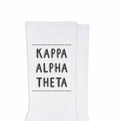 Kappa Alpha Theta sorority name design printed in sorority colors on comfy white cotton crew socks is the perfect gift for your sorority sisters.