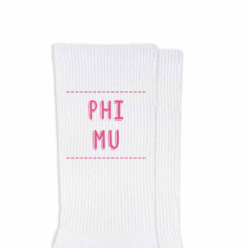 Phi Mu sorority name design printed in sorority colors on comfy white cotton crew socks is the perfect gift for your sorority sisters.