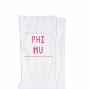Phi Mu sorority name design printed in sorority colors on comfy white cotton crew socks is the perfect gift for your sorority sisters.