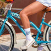 Tri Delta sorority letters and name digitally printed on white crew socks.