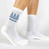Tri Delta sorority letters and name digitally printed on white crew socks.