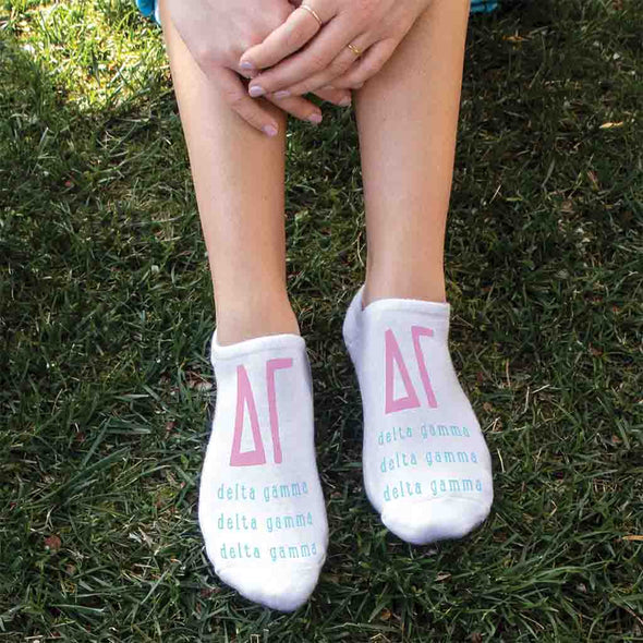 Delta Gamma sorority letters and name digitally printed on white no show socks.