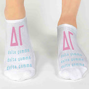 Delta Gamma sorority letters and name digitally printed on white no show socks.