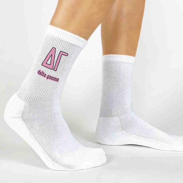 Delta Gamma sorority letters and name digitally printed on white crew socks.