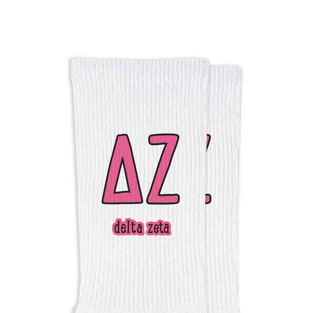 Delta Zeta sorority letters and name digitally printed on white crew socks.