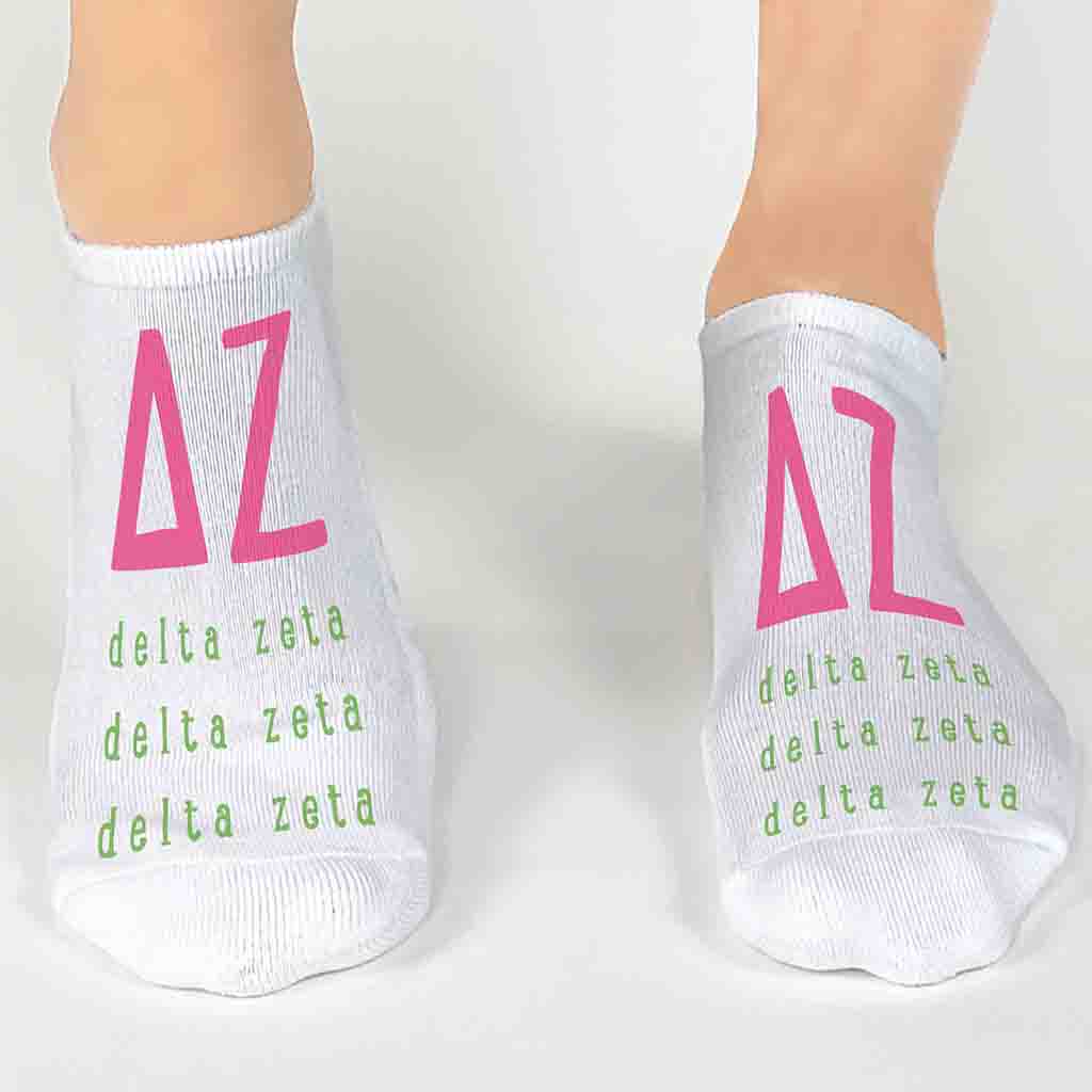 Delta Zeta sorority letters and name digitally printed in sorority colors on white no show socks.