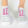 Delta Zeta sorority letters and name digitally printed in sorority colors on white no show socks.