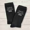 Personalized black crew socks for dad with the established date added to the design