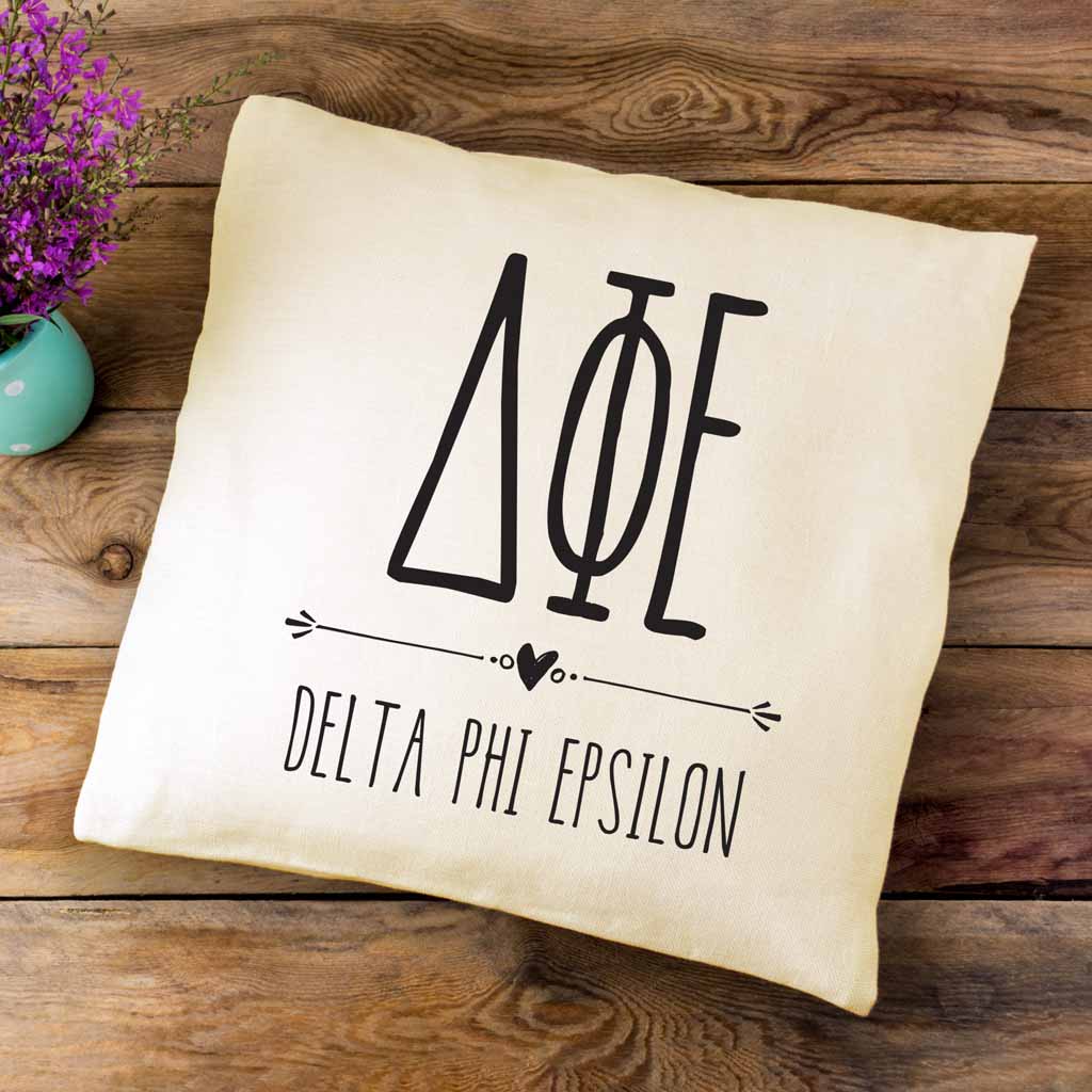 DPE sorority letters and name in boho style design custom printed on white or natural cotton throw pillow cover.