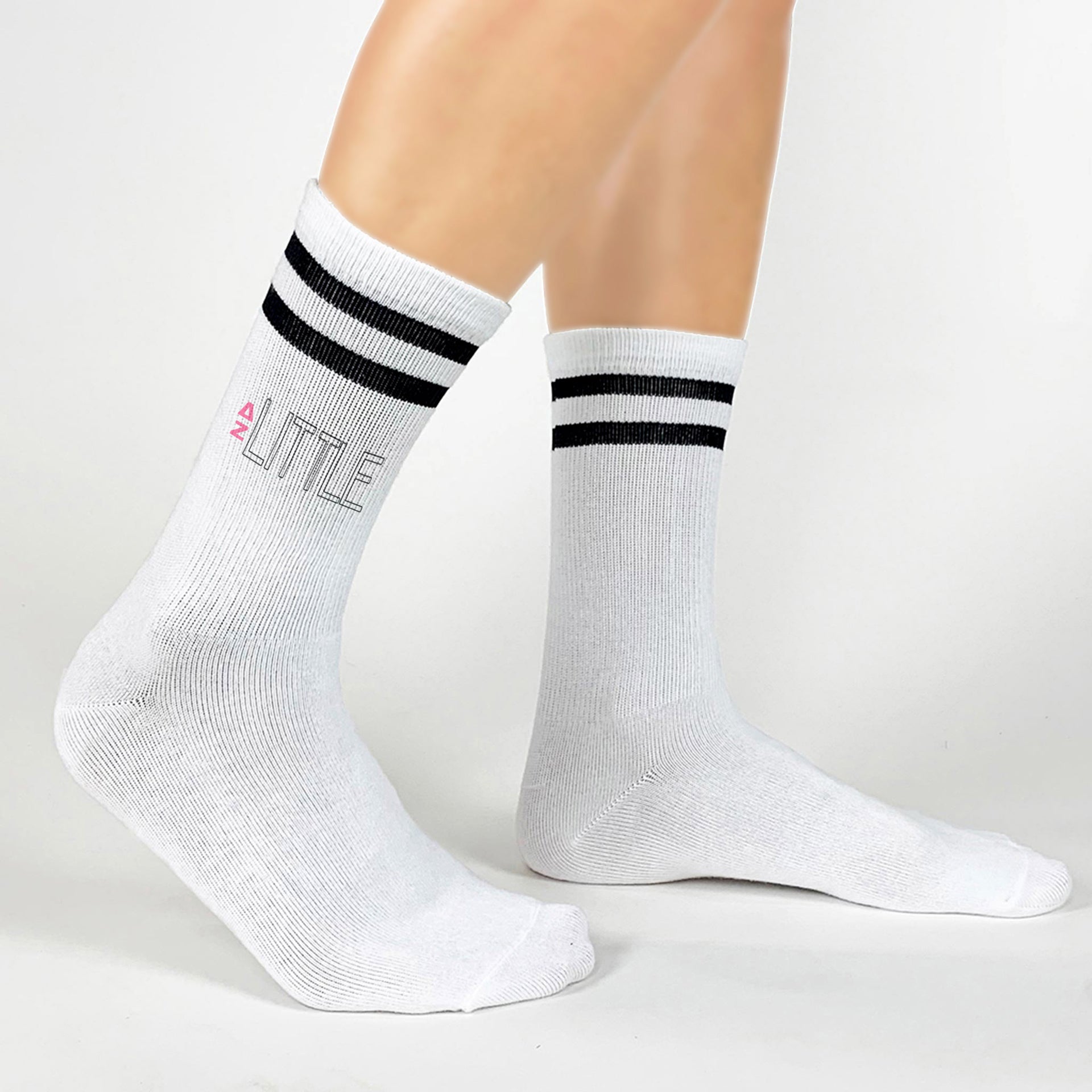 Sorority socks for your Little with greek letters printed on cotton crew socks.