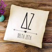DZ sorority letters and name in boho style design custom printed on white or natural cotton throw pillow cover.