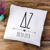 Delta Zeta sorority letters and name in boho style design custom printed on white or natural cotton throw pillow cover.