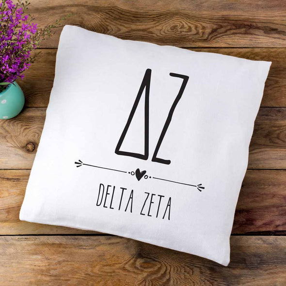 Delta Zeta sorority letters and name in boho style design custom printed on white or natural cotton throw pillow cover.