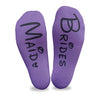Purple no show socks with printing on the bottom soles of the socks personalized for your wedding party.