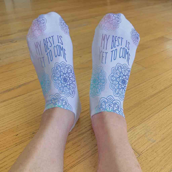 Soft and comfortable white cotton no show socks custom printed with self affirming motivational quote my best is yet to come.