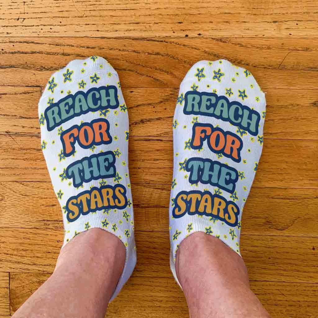 Self motivation socks with reach for the stars design digitally printed on no show socks.