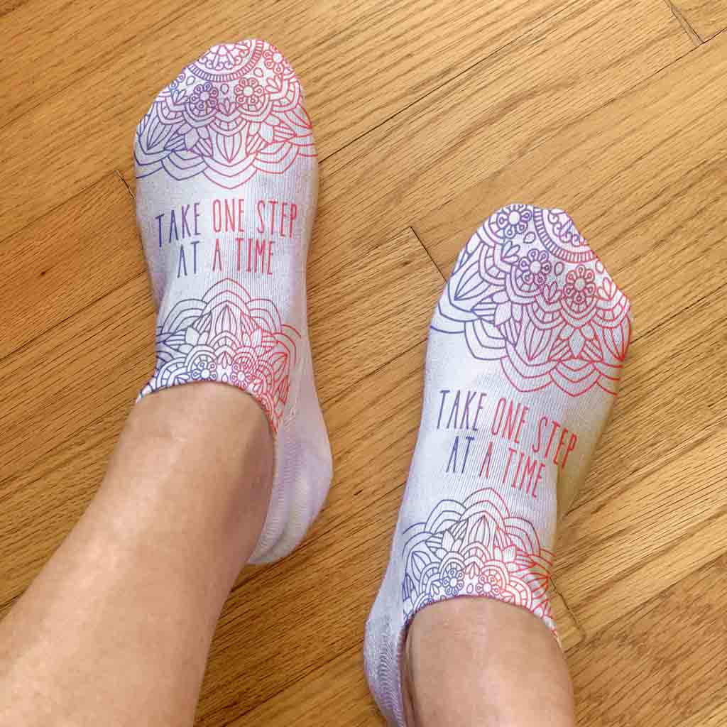 Take one step at a time full print self affirmation printed on white no show socks.
