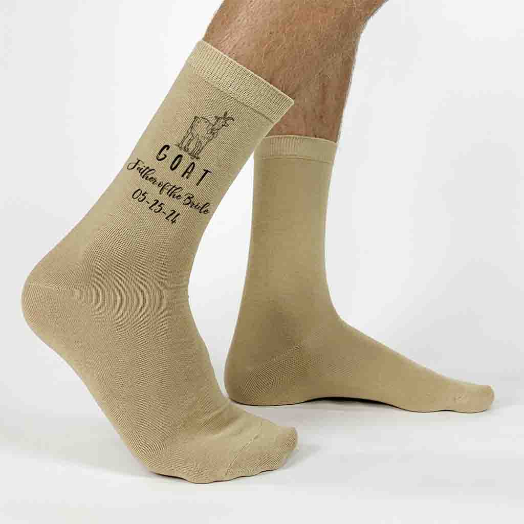 Fun personalized wedding socks for the GOAT father of the bride digitally printed and personalized with your wedding date and role make these the perfect wedding day gift.