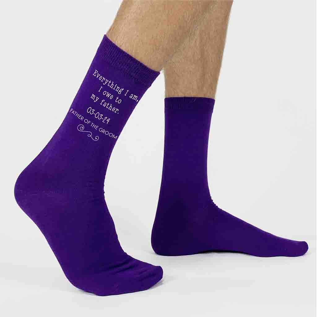 Purple flat knit wedding socks custom printed with father of the groom and your wedding date make the perfect gift for the father of the groom on your special day.
