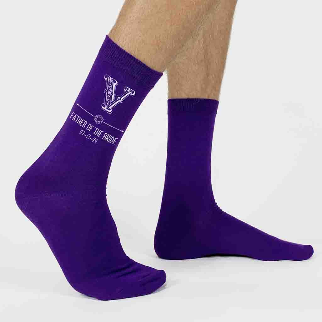 Steampunk wedding party design personalized with the first initial monogram, wedding date and wedding role, these custom wedding socks are stylized with a gear monogram design is the perfect keepsake for your entire wedding party.