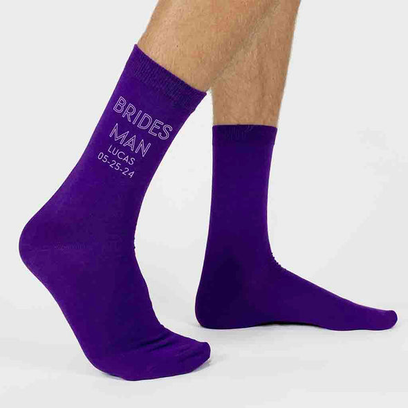 Personalized groomsmen socks for the wedding party designed with a minimalist style look custom printed for the entire wedding party make a great gift.