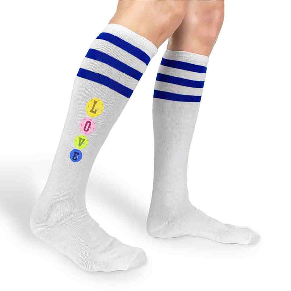 Love pickleball design by sockprints digitally printed on the side of the knee high socks.