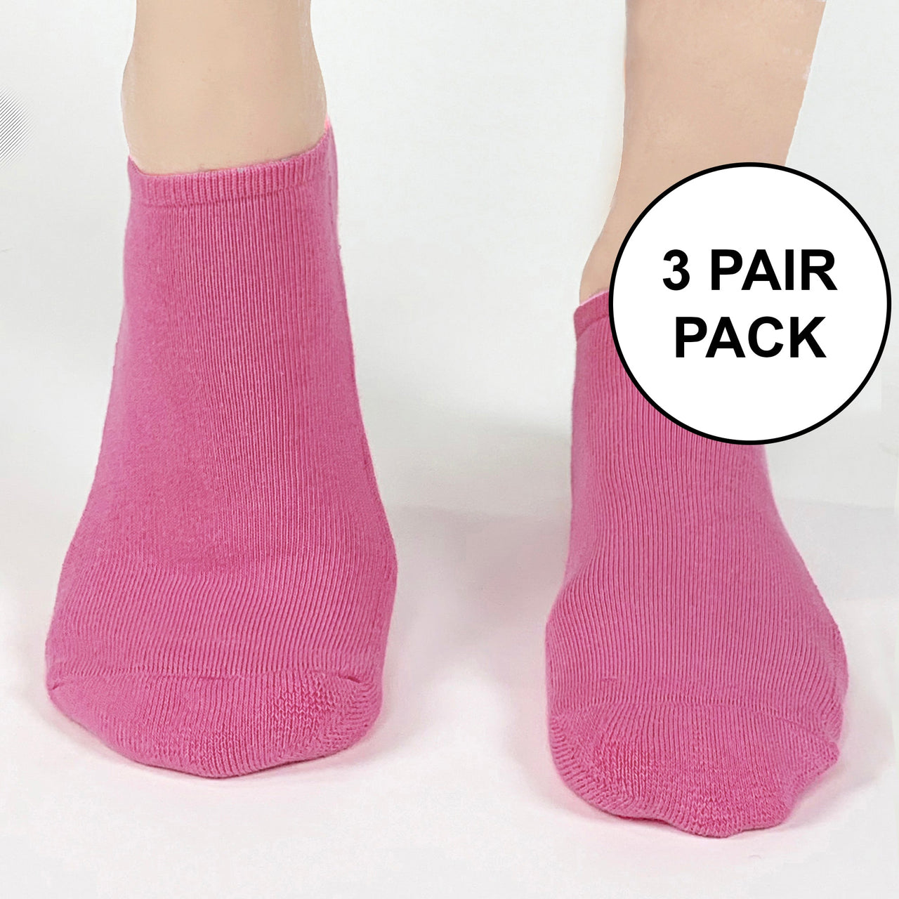 Super soft fuchsia cotton blend no show socks available in three sizes sold as a three pair pack in same size and color.