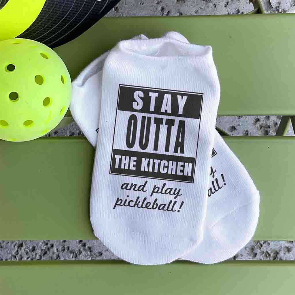 Stay outta the kitchen and play pickleball digitally printed on the top of the white cotton no show socks custom designed by sockprints.