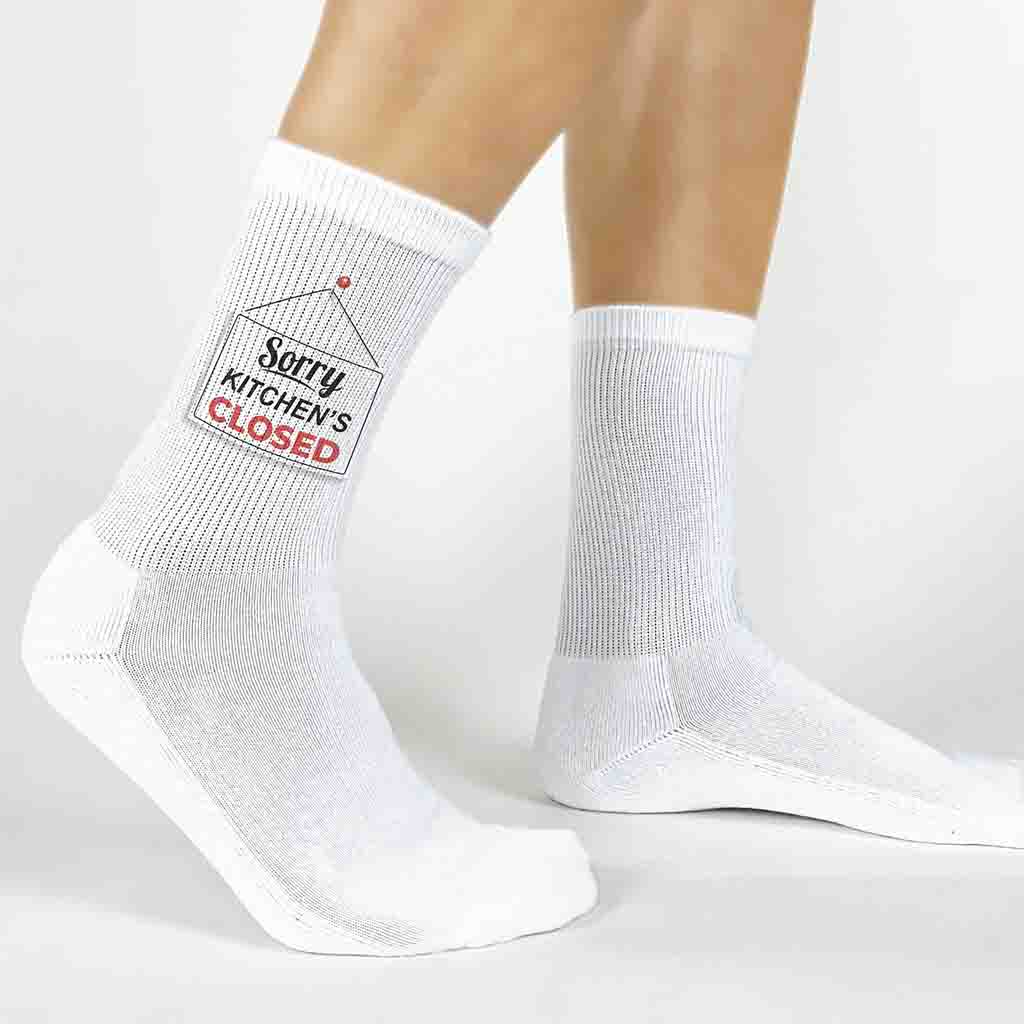 Funny pickleball design custom printed by sockprints on white cotton crew socks.