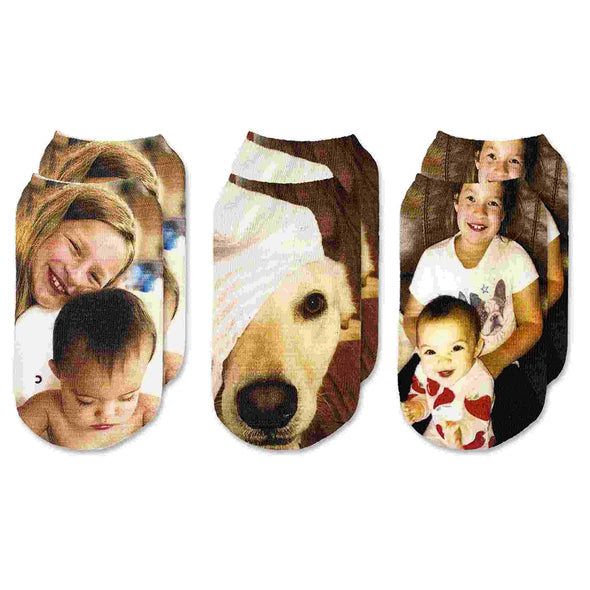 Custom printed photo socks sold in a three pair gift box set.