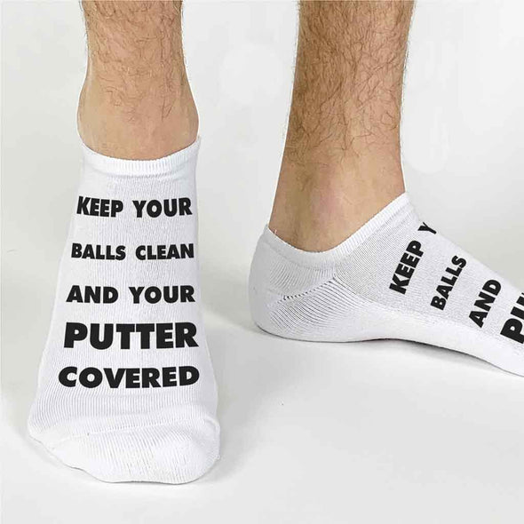 Funny golf socks digitally printed with keep your balls clean and your putter covered make a great gift for any golfer
