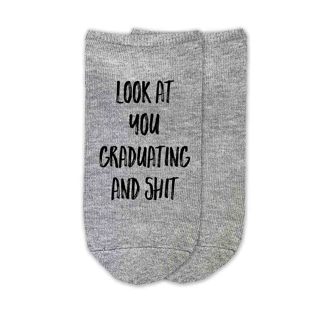 Digitally printed custom socks for senior year look at your graduating and shit