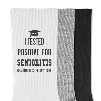 I tested positive for senioritis graduation is the only cure custom printed on cotton crew socks are the perfect gift for your graduating senior.