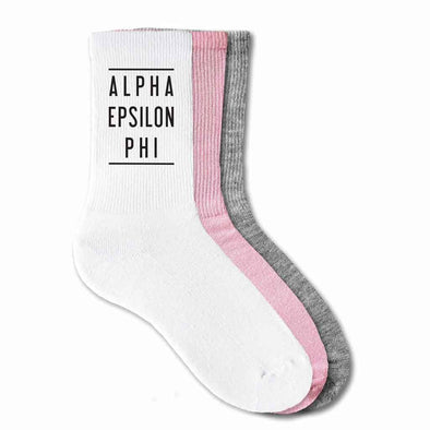 Alpha Epsilon Phi sorority name custom printed on cotton crew socks available in white, pink, or heather gray.
