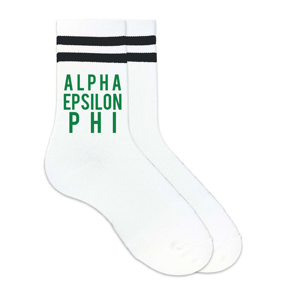 Alpha Epsilon Phi sorority name in block letters digitally printed in ink on striped crew socks.