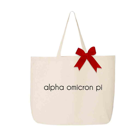 Alpha Omicron Pi sorority name digitally printed on canvas tote bag with bow.