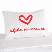Alpha Omicron Pi sorority name with heart design custom printed on pillowcase.