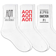 Alpha Omicron Pi sorority crew socks with sorority name and Greek letters sold as a 3 pair gift set.